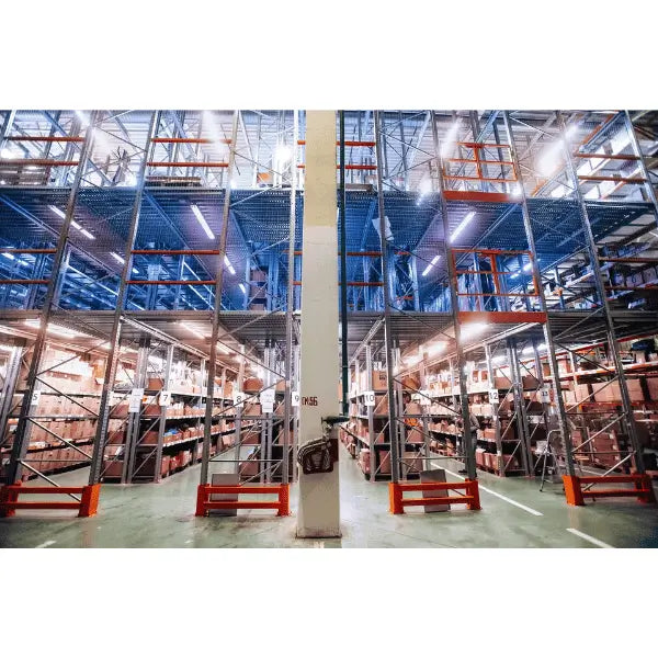 Pallet rack supported mezzanine lifestyle view showing industrial warehouse storage system in real working environment