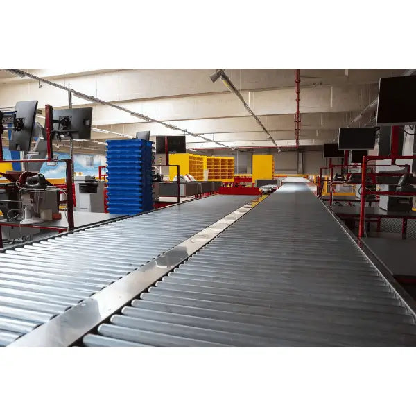 Light-duty galvanized gravity roller conveyor straight section installed in warehouse environment for material handling operations