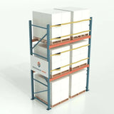 Pallet rack safety strap side view with rack showing industrial warehouse load securing system for pallet rack stabilization and fall protection
